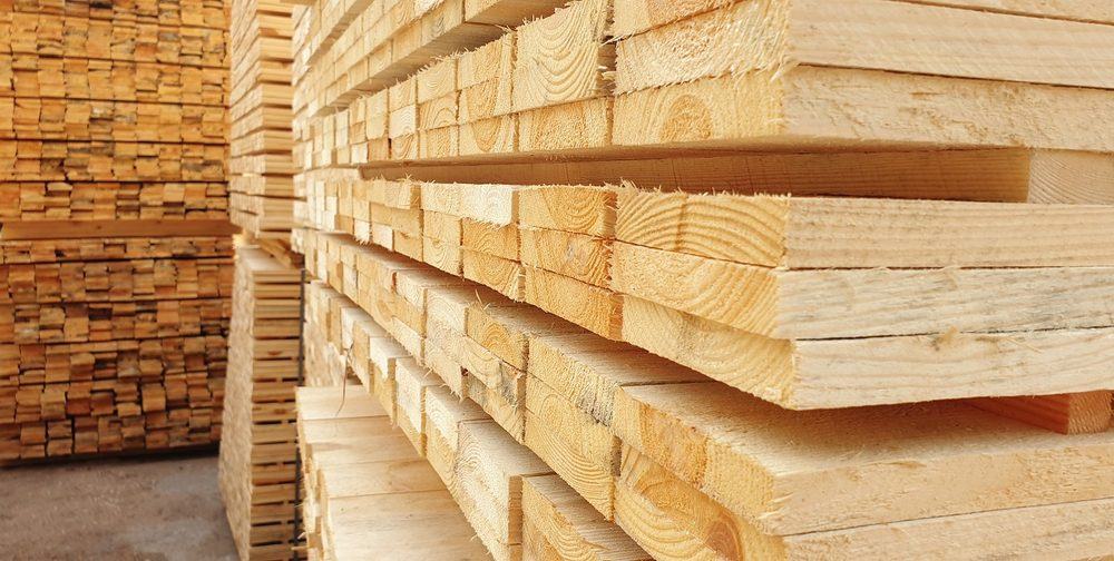 Stacks of sawn lumber boards at a lumberyard